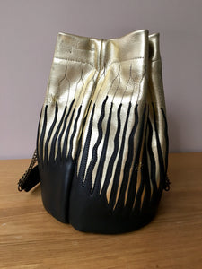 Sac Bourse Garnier noir et or